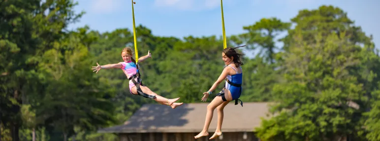 Two girls on the zipline