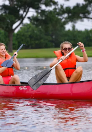 two girls in a canoe